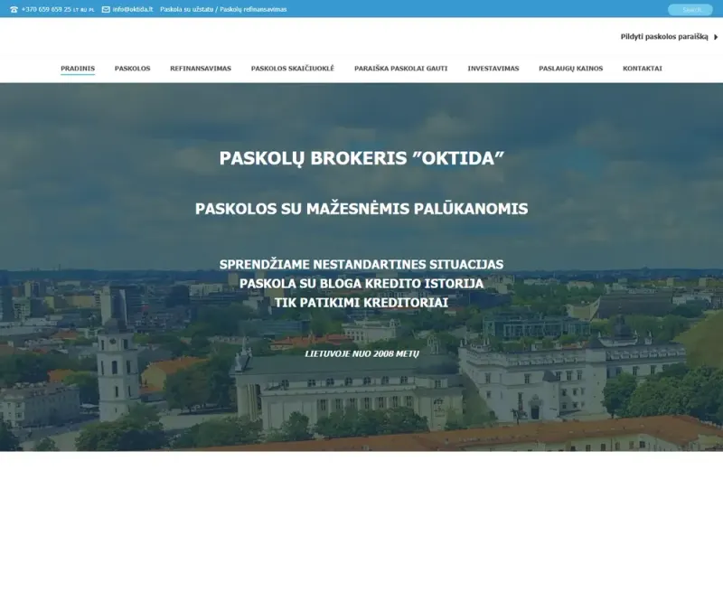 Sena paskolasuuzstatu.lt svetainė 2021 m.: Vilniaus panorama ir baltas tekstas „Paskolų brokeris OKTIDA“
